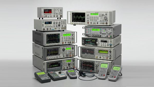 A variety of Test & Measurement instruments including an oscilloscope and signal generator.